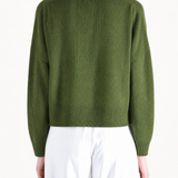 Green knitwear, full body view