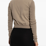 Brown hoodies worn by a person, showing the hoodies fit