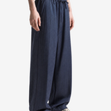 Navy pants, full body view