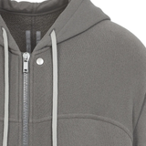 close up of grey jackets-coats, showing texture of the cotton fabric