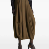 Brown skirt worn by a person, showing the skirt's fit
