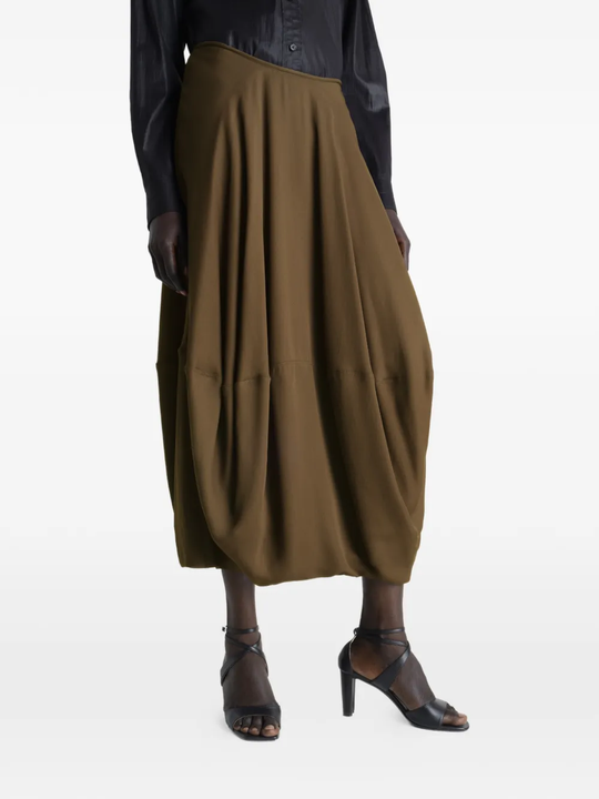 Brown skirt worn by a person, showing the skirt's fit
