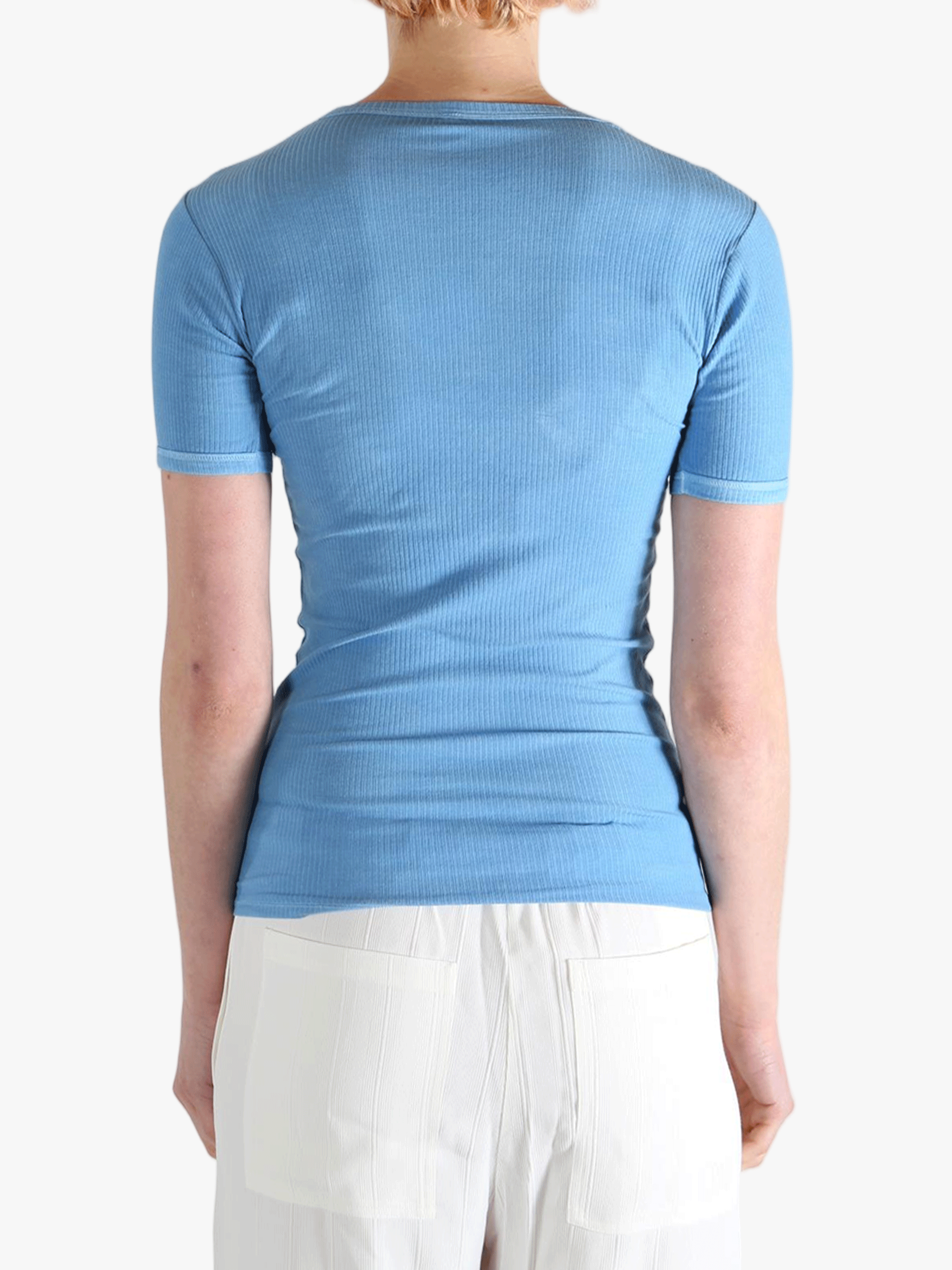 navy t-shirts worn by a person, showing the t-shirts fit