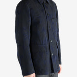 Navy jacket worn by a person, showing the jacket's fit