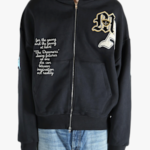 Black jacket worn by a person, showing the jacket's fit