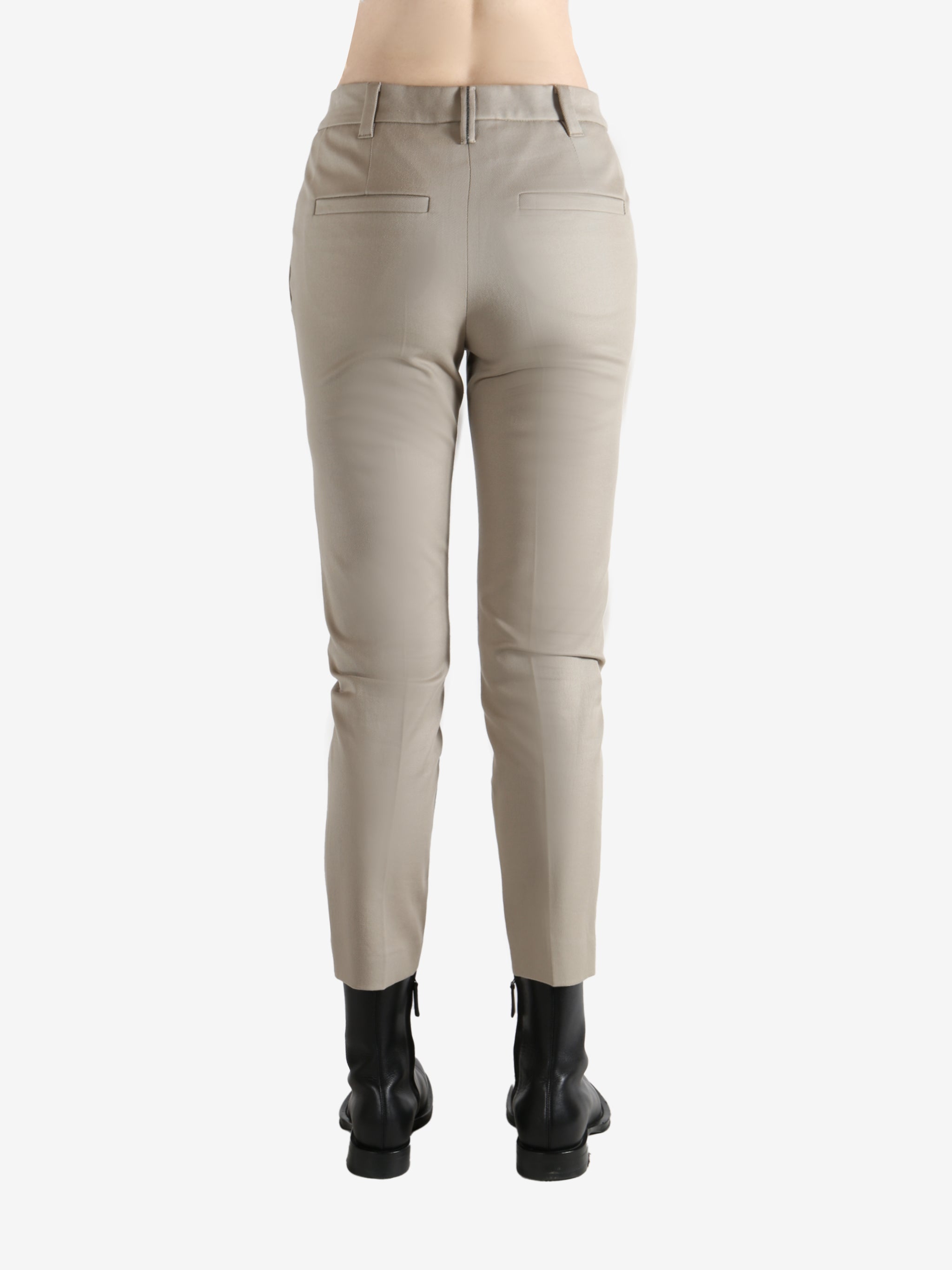 Tan pants worn  by a person, showing the pants' fit