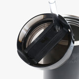 Close up of black home, showing texture of the stainless steel fabric