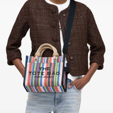 Red bag worn by a person, showing the bag's fit