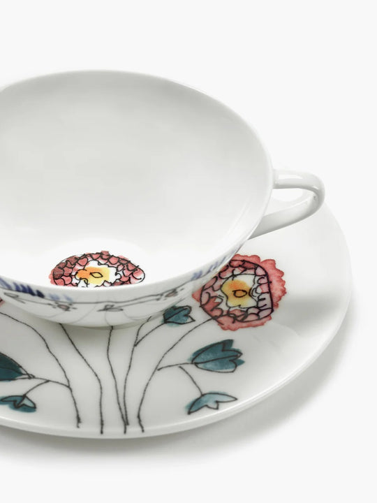 Close up of white cup , showing texture of the bone porcelain fabric