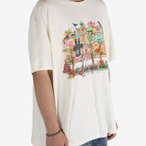 White t-shirt worn by a person, showing the shirt's fit