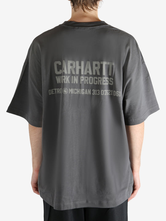 Grey t-shirt worn by a person, showing the t-shirt's fit