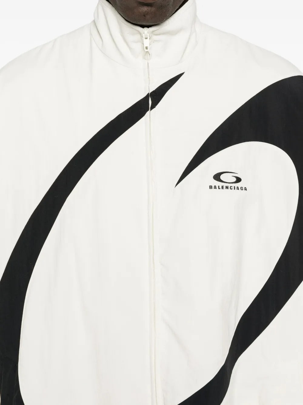Close up of white jacket, showing texture of the polyamide fabric