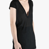 Black T-shirt worn by a person, showing the T-shirt's fit