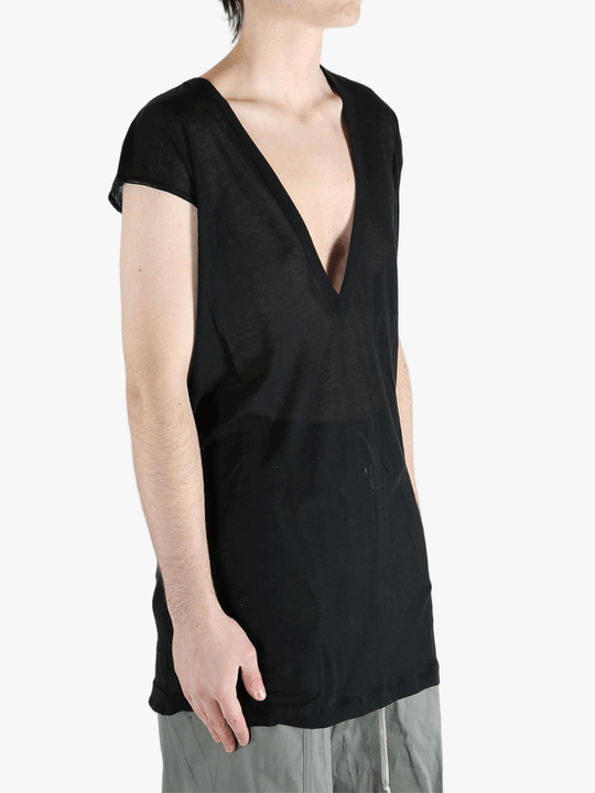 Black T-shirt worn by a person, showing the T-shirt's fit