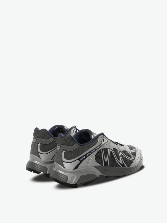 Grey sneakers, back view