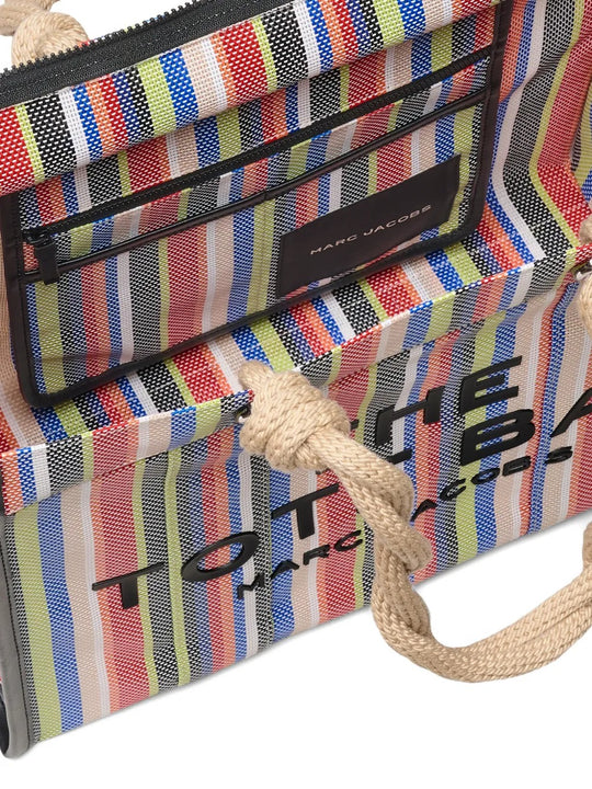 Close up of the red bag, showing texture of the PVC fabric