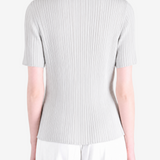 Grey shirt worn by a person, showing the shirt fit