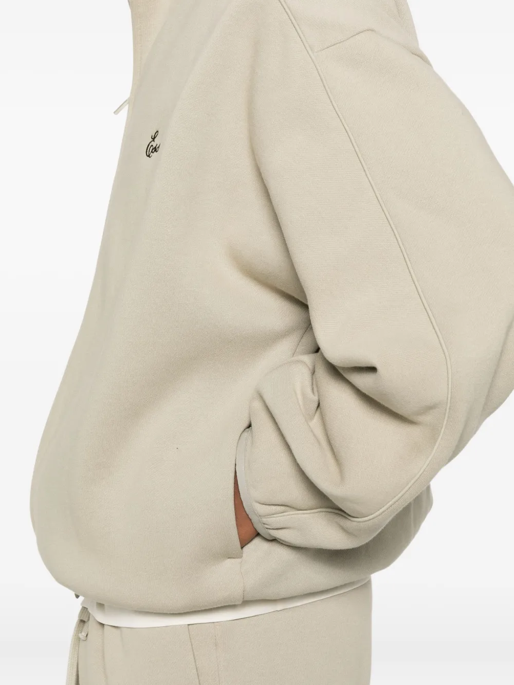 Close up of grey jacket,showing texture of the cotton fabric.