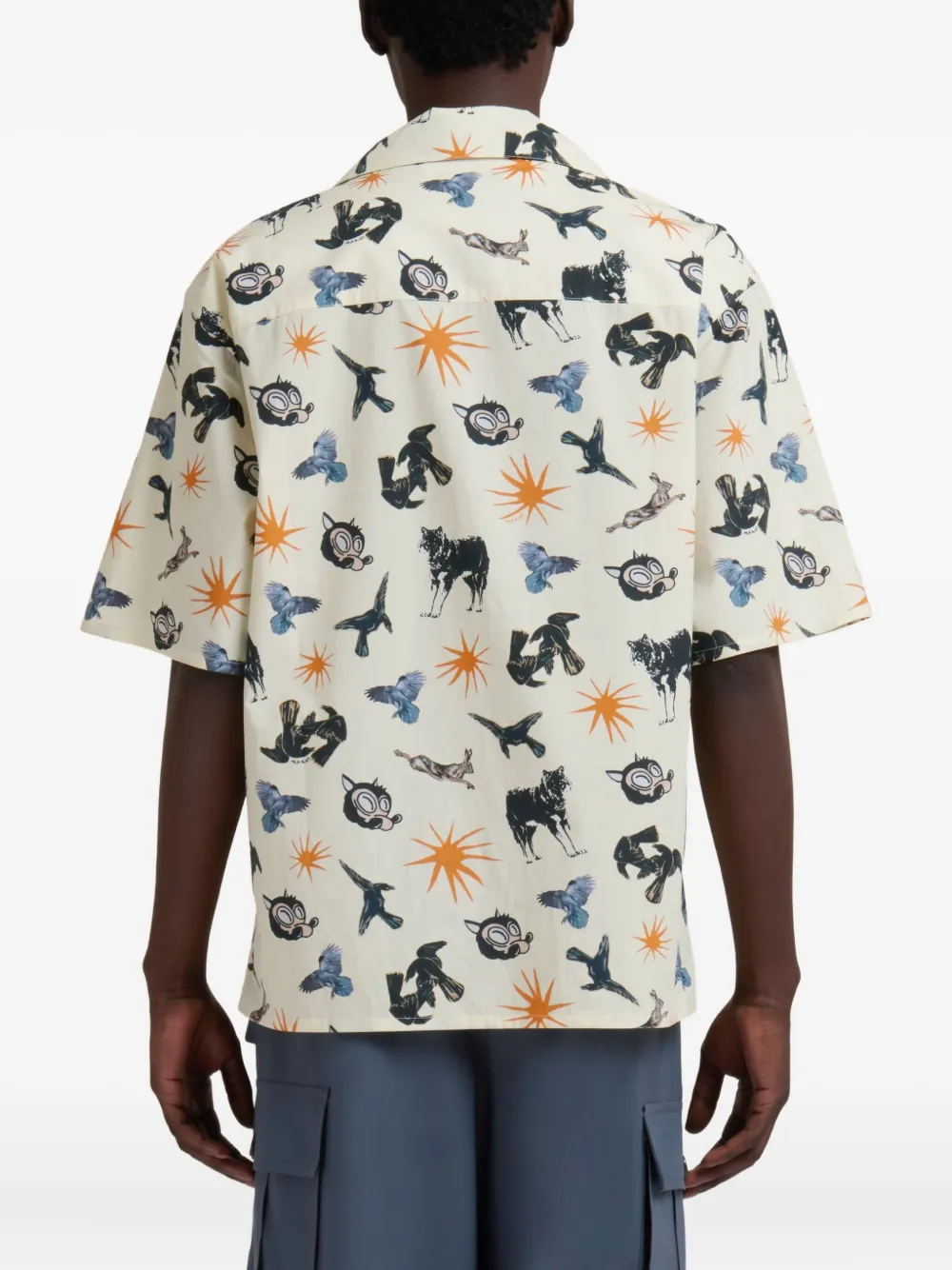 Tan shirts worn by a person, showing the shirts fit