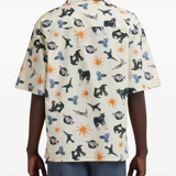 Tan shirts worn by a person, showing the shirts fit