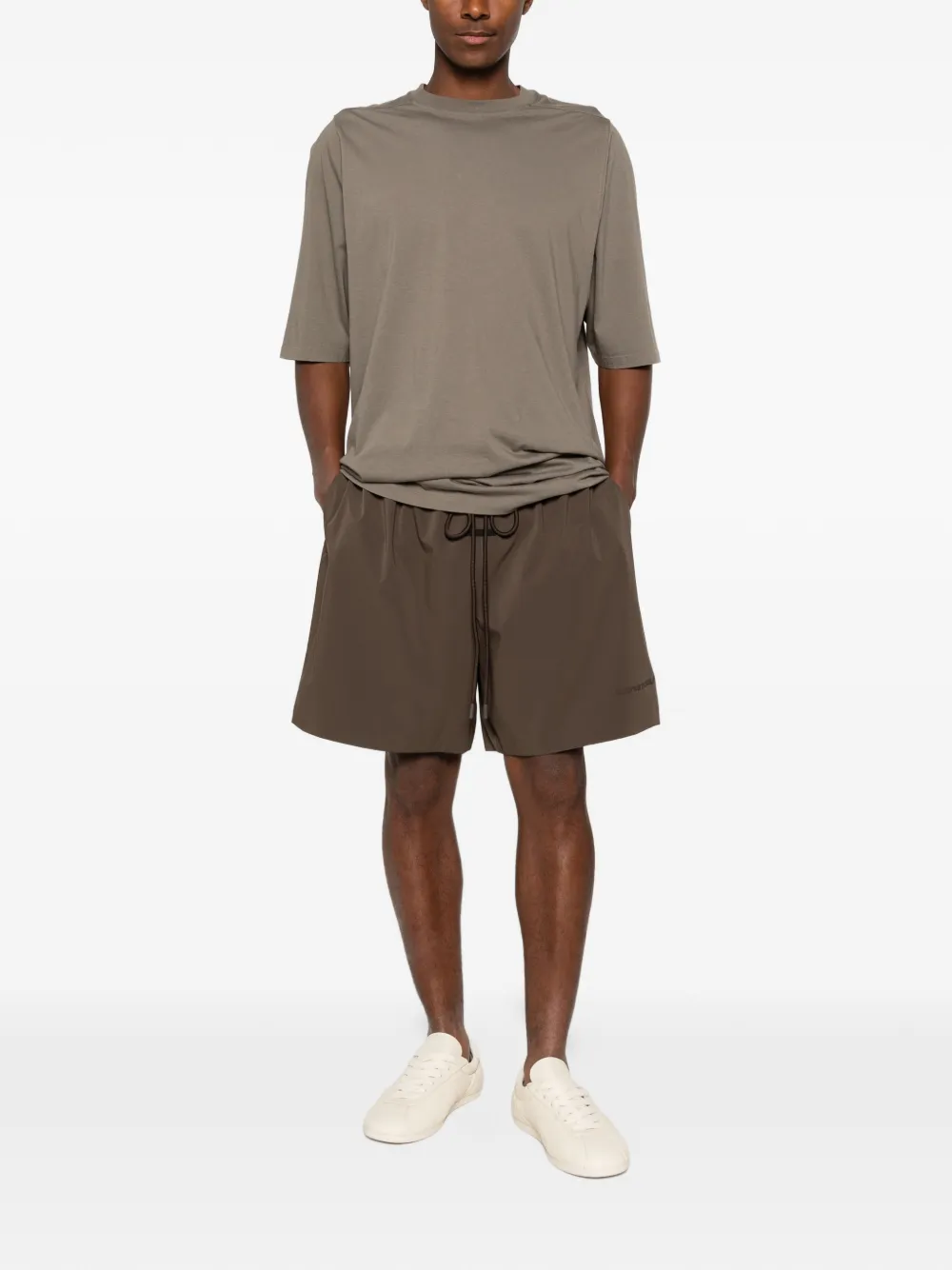 Brown shorts, full body view