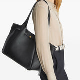 Black bags worn by a person, showing the bags fit