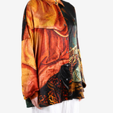 Orange shirt worn by a person, showing the shirt fit