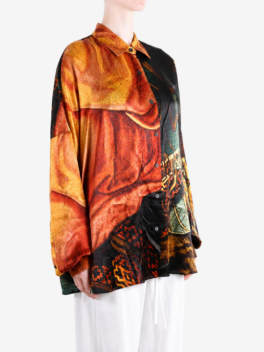 Orange shirt worn by a person, showing the shirt fit