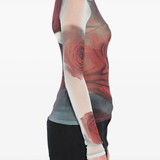 White top worn by a person, showing the top's fit