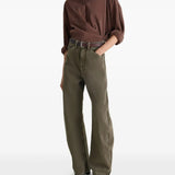 Green jeans, full body view