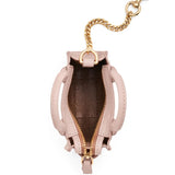  Close up of pink bag, showing texture of the leather fabric