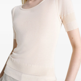close up of white tops, showing texture of the viscose fabric