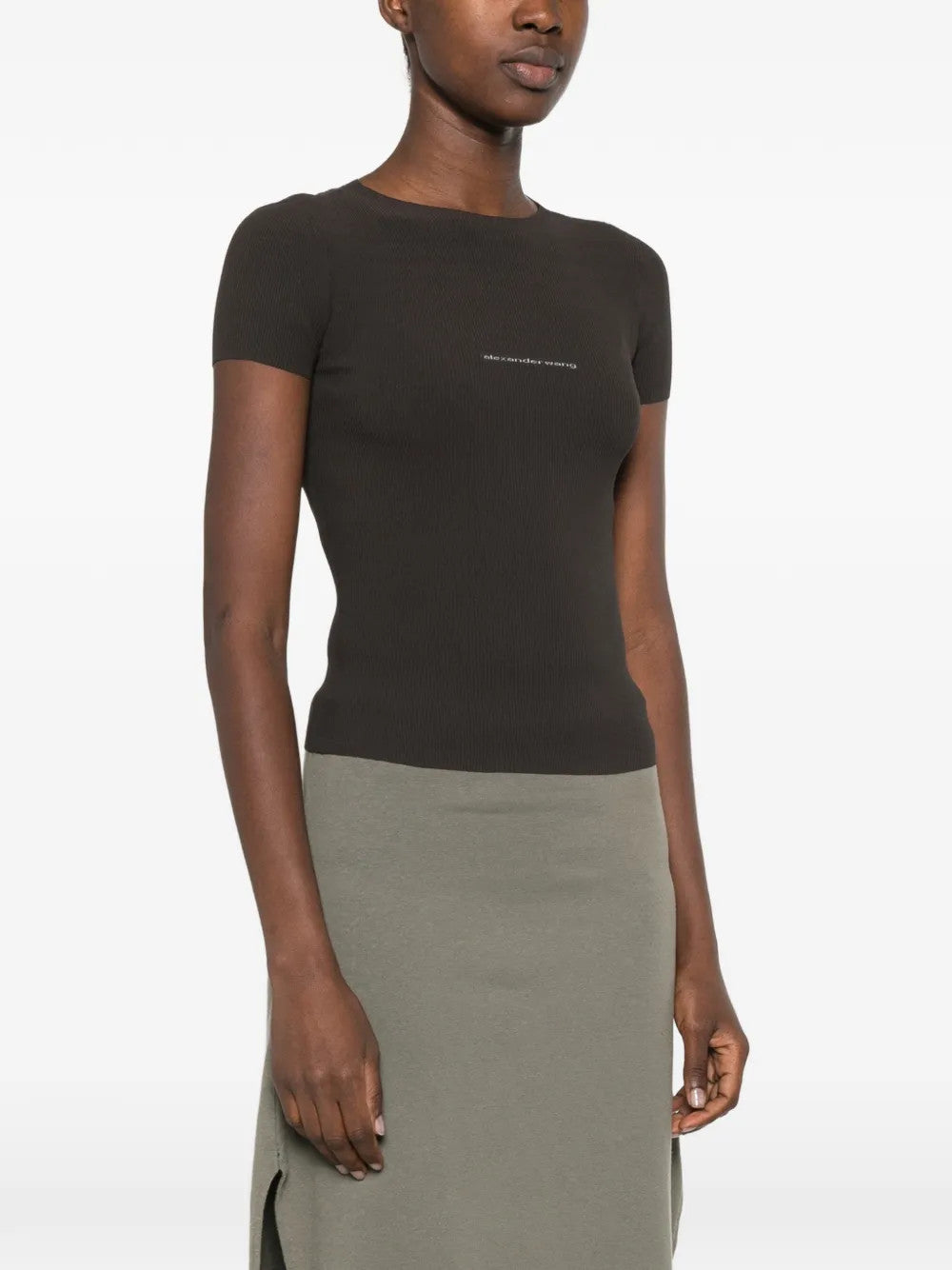 Black t-shirt worn by a person, showing the t-shirt fit