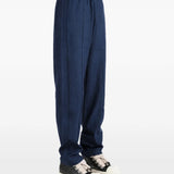 Navy pants, full body view