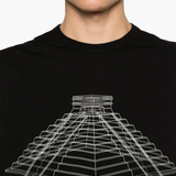 Close up of black t-shirt, showing texture of the orangic cotton fabric