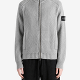 Grey knitwear, front view