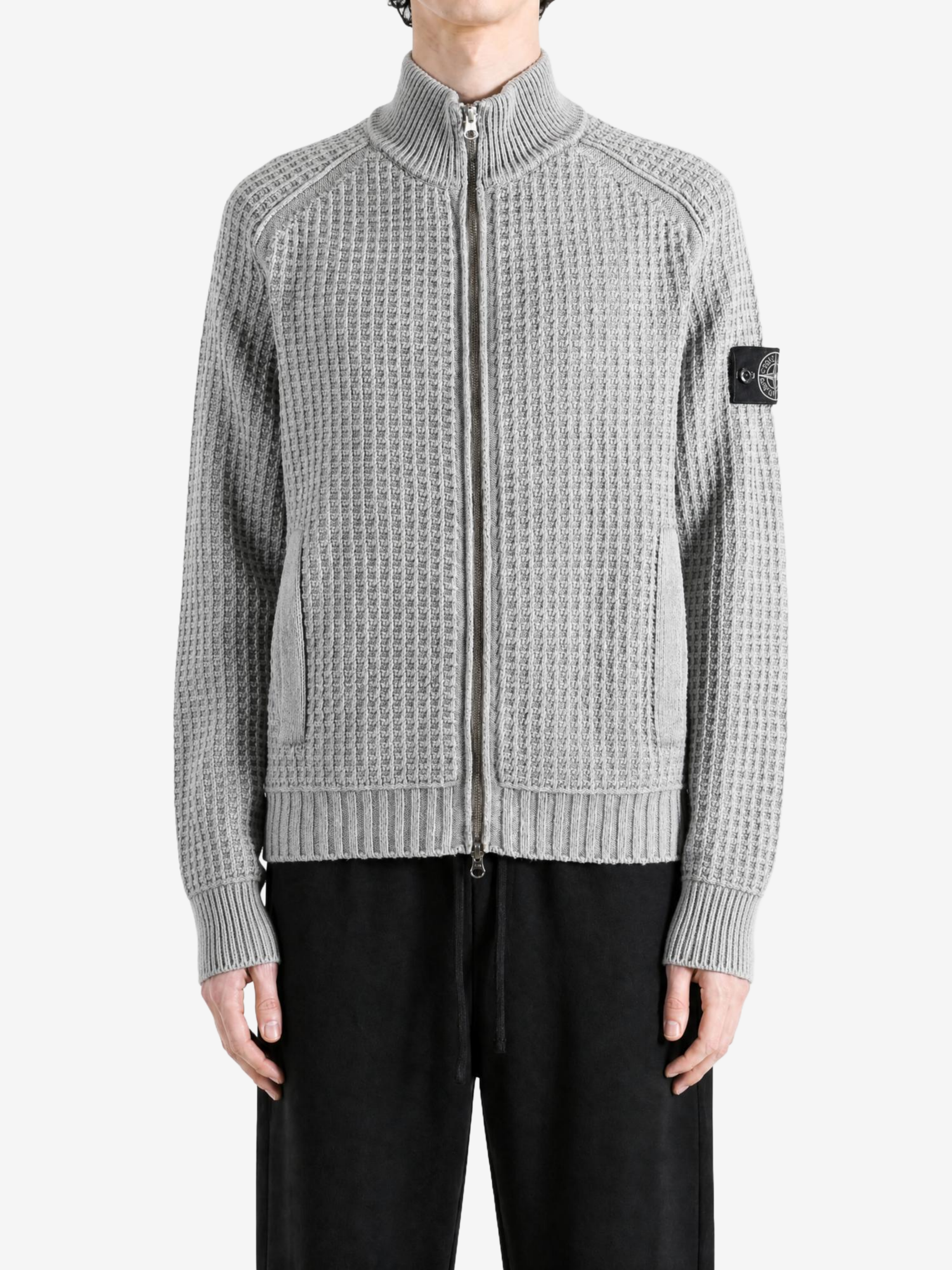 Grey knitwear, front view