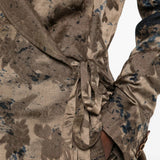 Close up of Brown jacket, showing texture of the 57% linen/ 43% viscose fabric