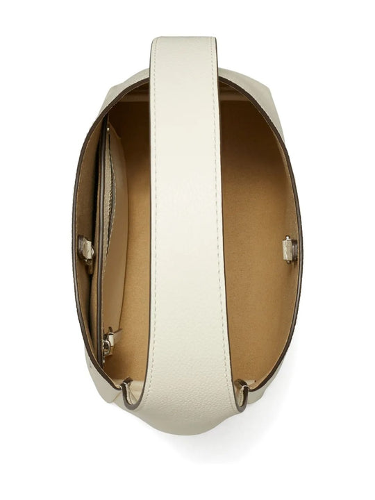 Close up of the white bag, showing texture of the leather fabric