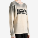 Tan hoodie worn by a person, showing the hoodie fit
