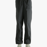 Grey pant worn by a person, showing the pant's fit