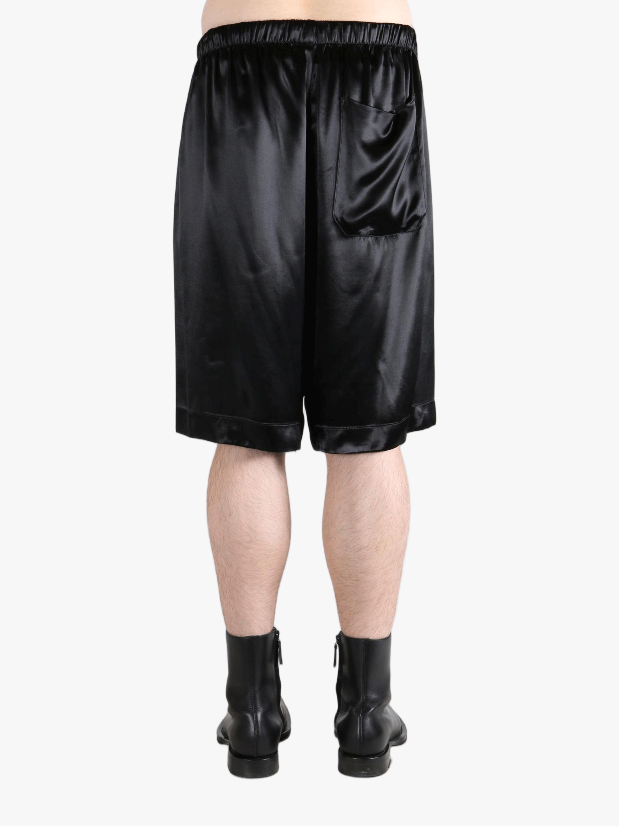 Black short worn by a person, showing the short fit