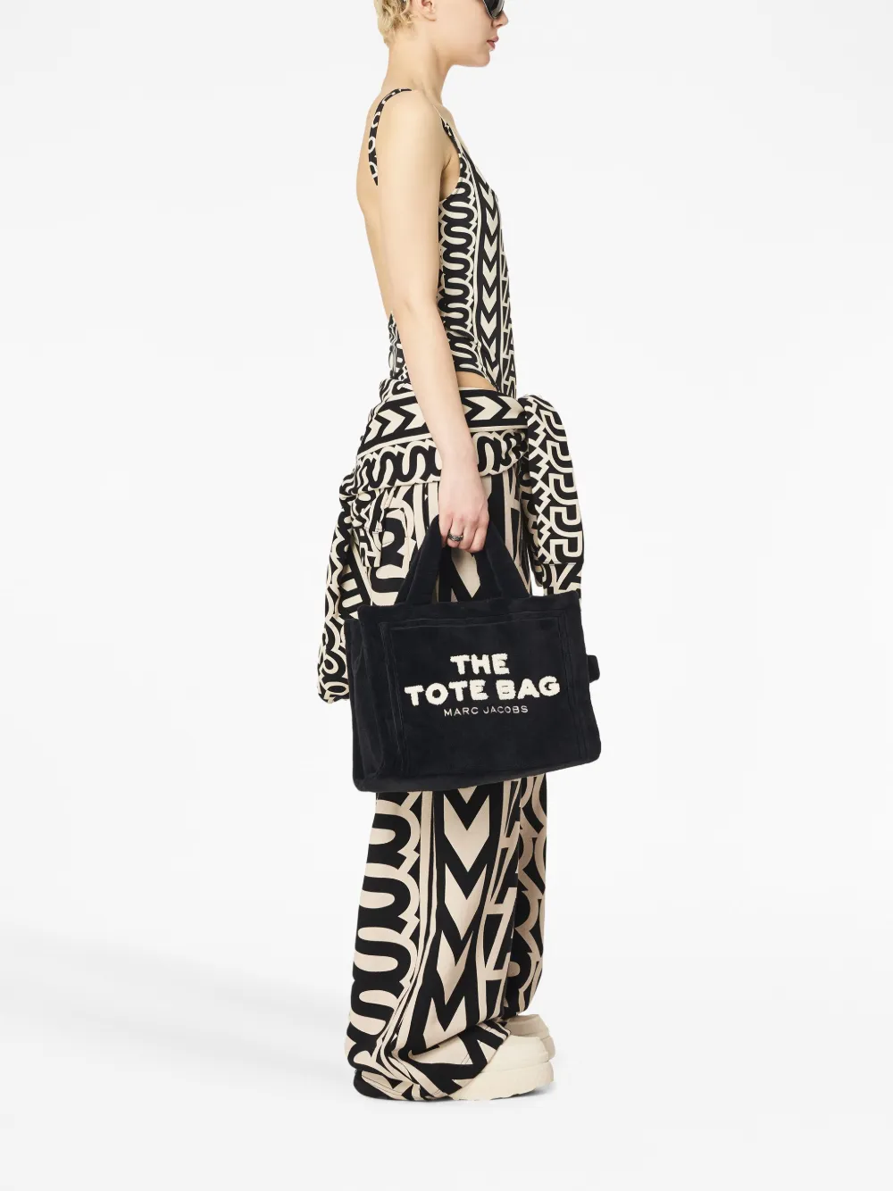 black bag worn by a person, showing the bag fit