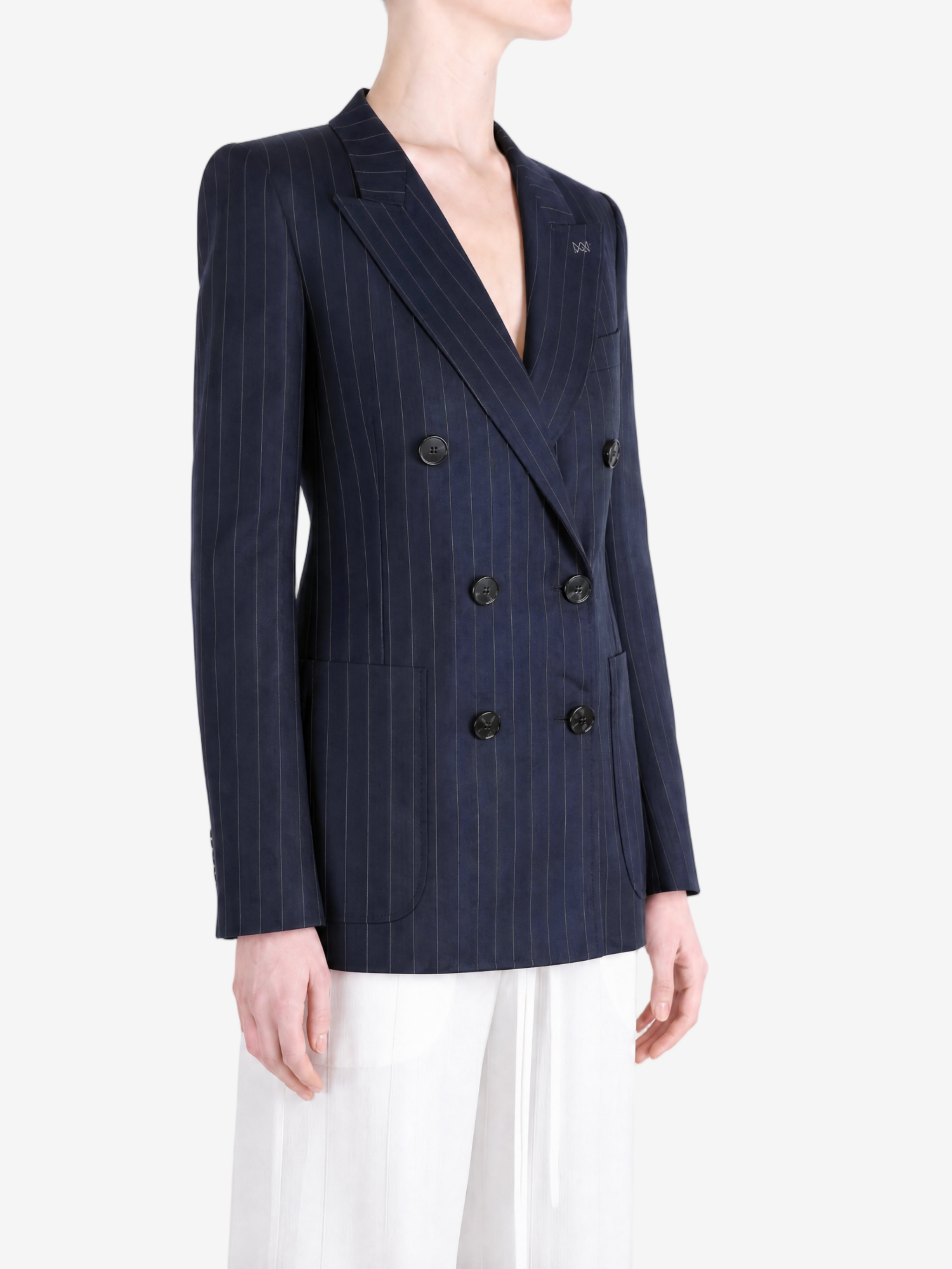 Navy jacket worn by a person, showing the jacket fit