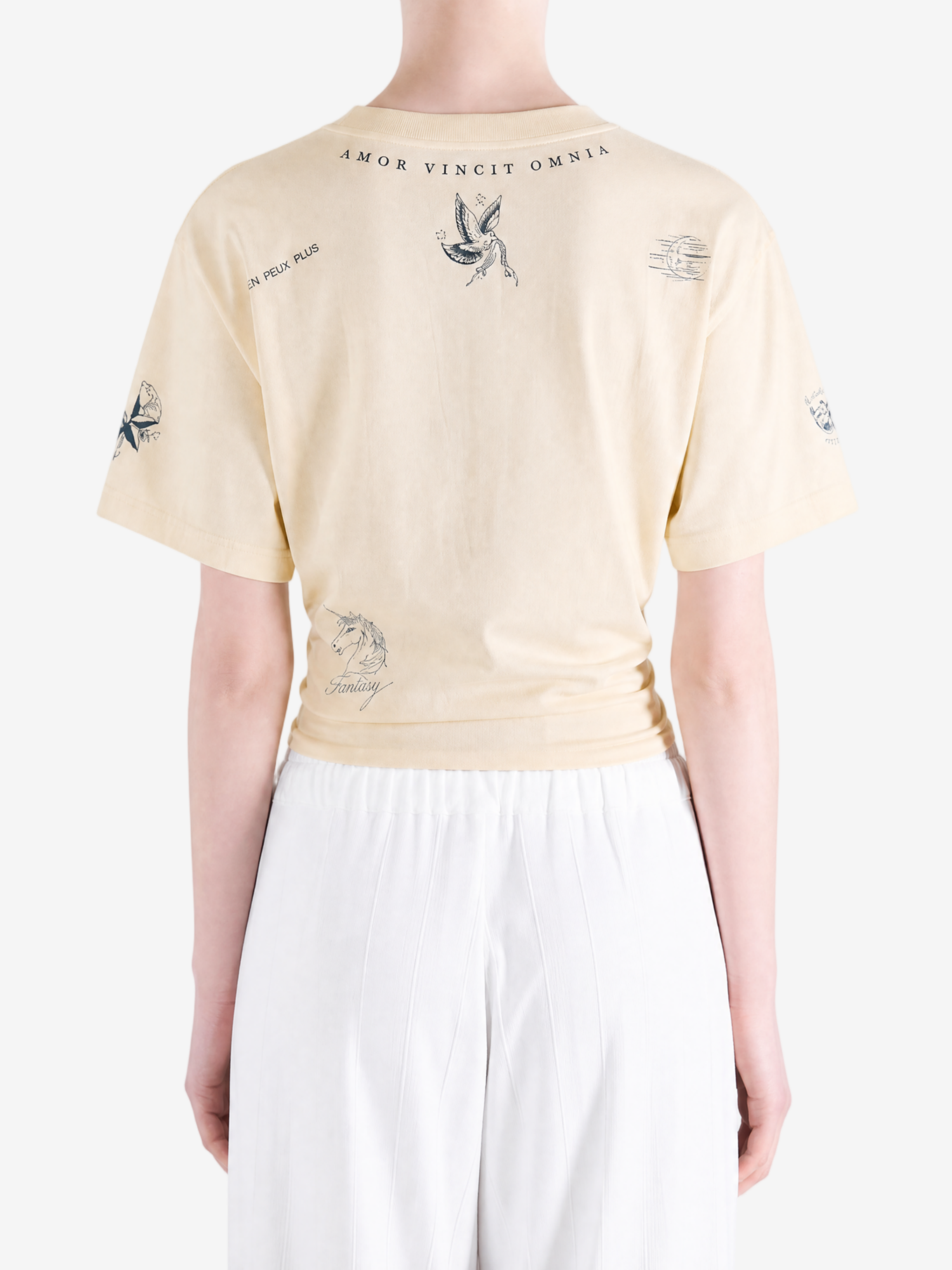 Tan top worn by a person, showing the top fit