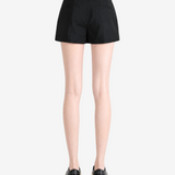Black shorts worn by a person, showing the shorts fit