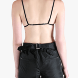 Black activewear worn by a person, showing the activewear's fit