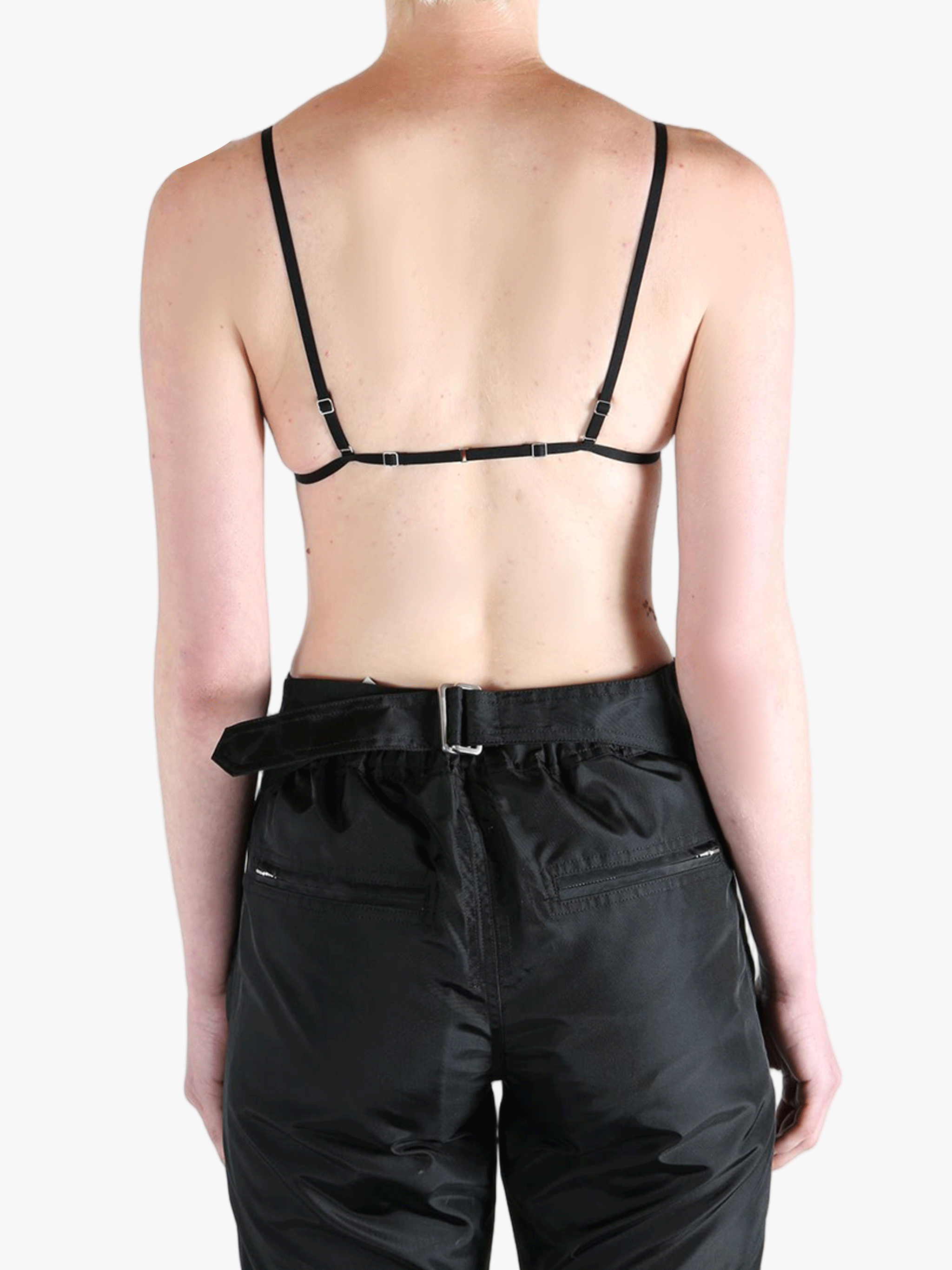 Black activewear worn by a person, showing the activewear's fit