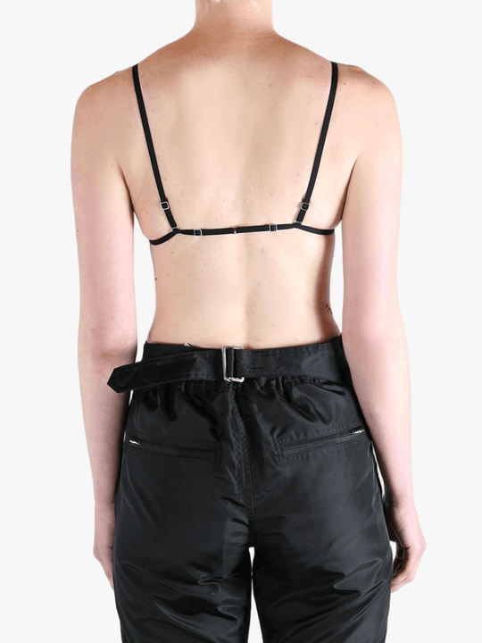 Black activewear worn by a person, showing the activewear's fit