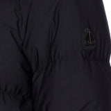Close up of the black coat, showing texture of the nylon fabric